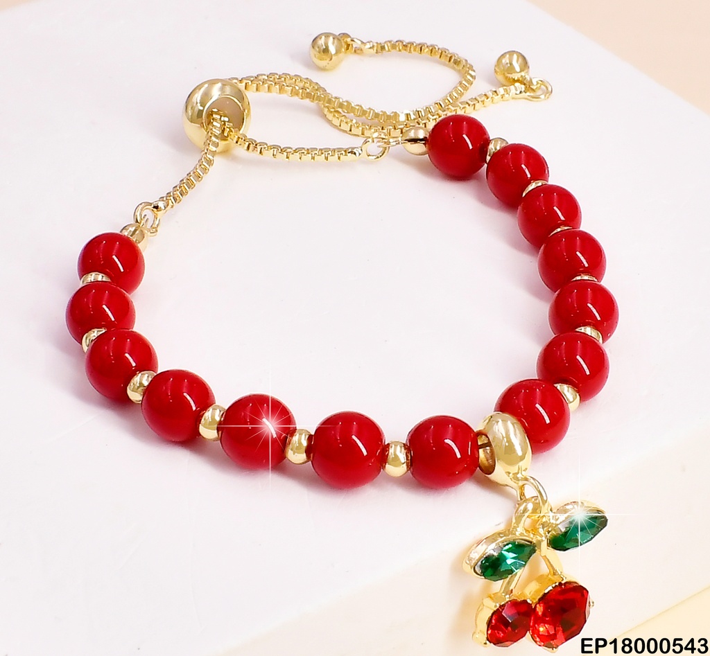 PULSERA AJUST. PELOTAS ROJAS DIJE:🍒ZIRC. GR. BE312-9