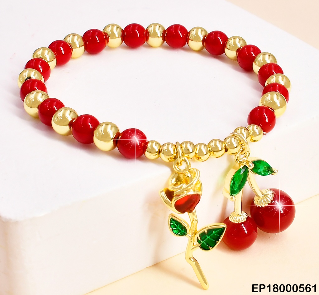 PULSERA PELOTAS ROJAS C/DOR.DIJES ROSA/CEREZAS BE332-294