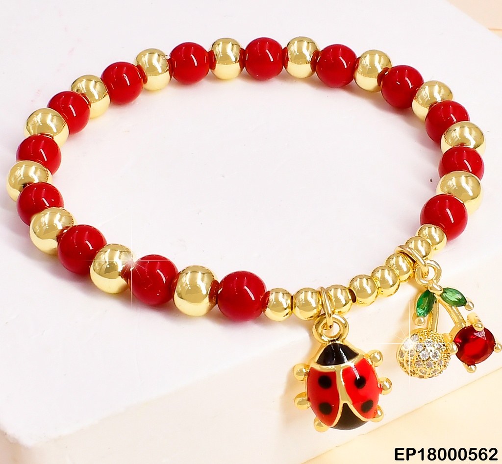 PULSERA PELOTAS ROJAS C/DOR.DIJES:MARIQUITA/CEREZAS BE333-294