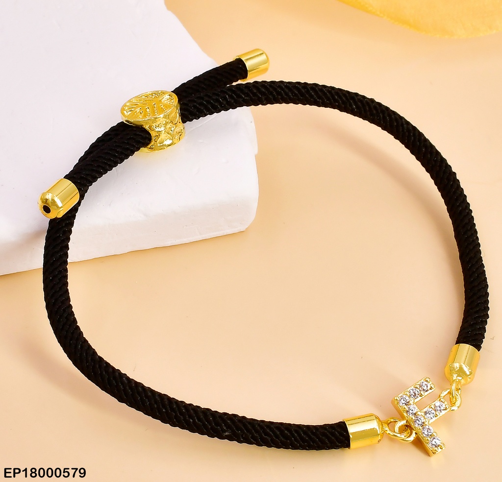 PULSERA NEGRA LETRA "F" ZIRC. BE252-5