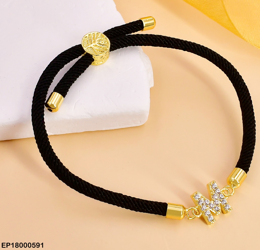 PULSERA NEGRA LETRA "M" ZIRC. BE264-5