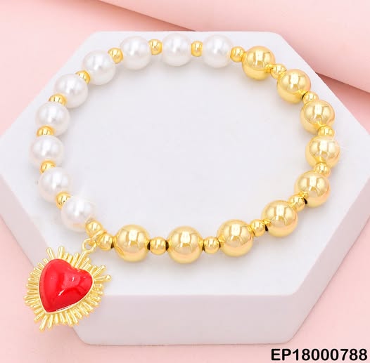 PULSERA MITAD PELOTA/MITAD PERLAS DIJE:❤️C/RAYOS BE404-9