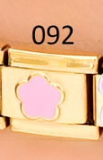 CHARM ITALIANO 18K ACERO INOX. 9*10MM FLOR ROSA