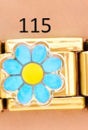 CHARM ITALIANO 18K ACERO INOX. 9*10MM FLOR CELESTE
