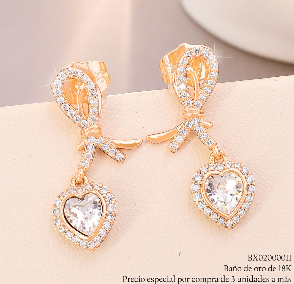 ARETES BAÑO DE ORO 18K XUPING LAZO ZIRC.C/CORAZON🤍JEYX-7890 (X)