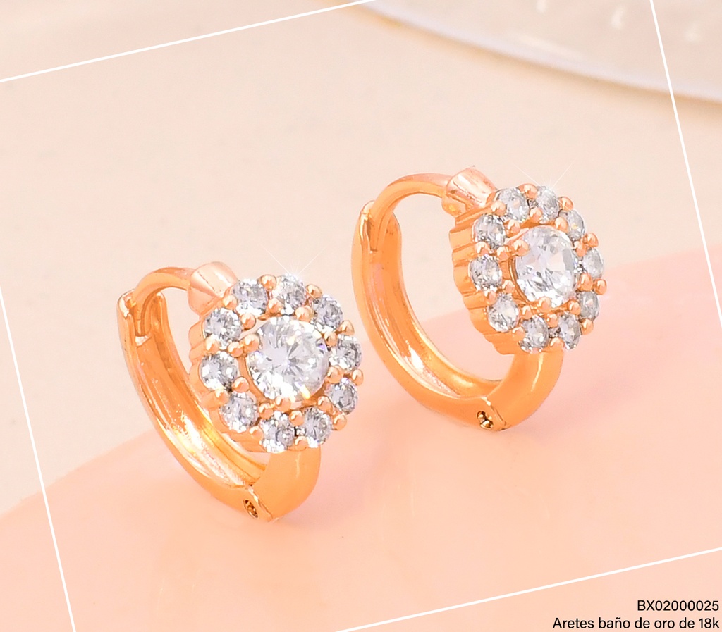 ARETES HUGGIES BAÑO DE ORO 18K. XUPING FLOR ZIRCONIAS 28480