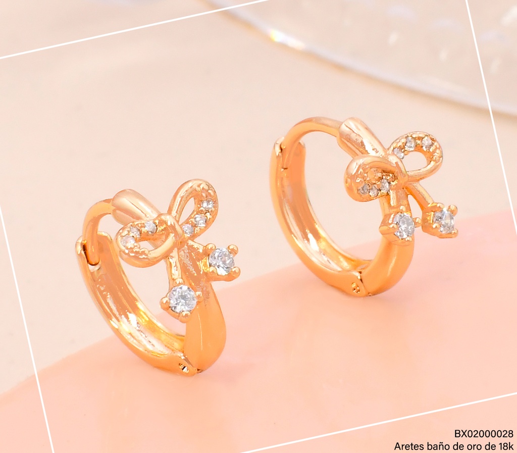 ARETES HUGGIES BAÑO DE ORO 18K. XUPING LAZO C/ZIRC. 28480(X)