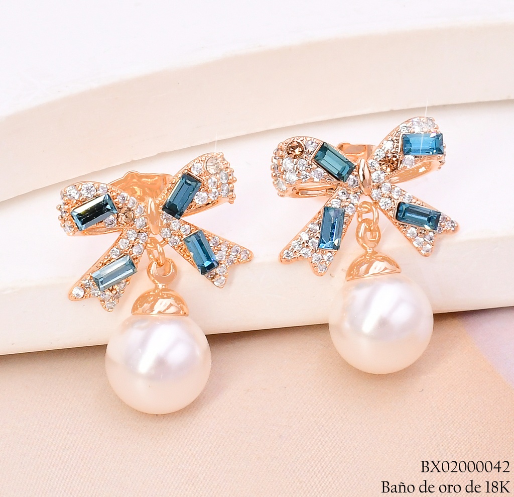 ARETES BAÑO DE ORO 18K. XUPING LAZOS ZIRC.VERDES C/PERLA (X)
