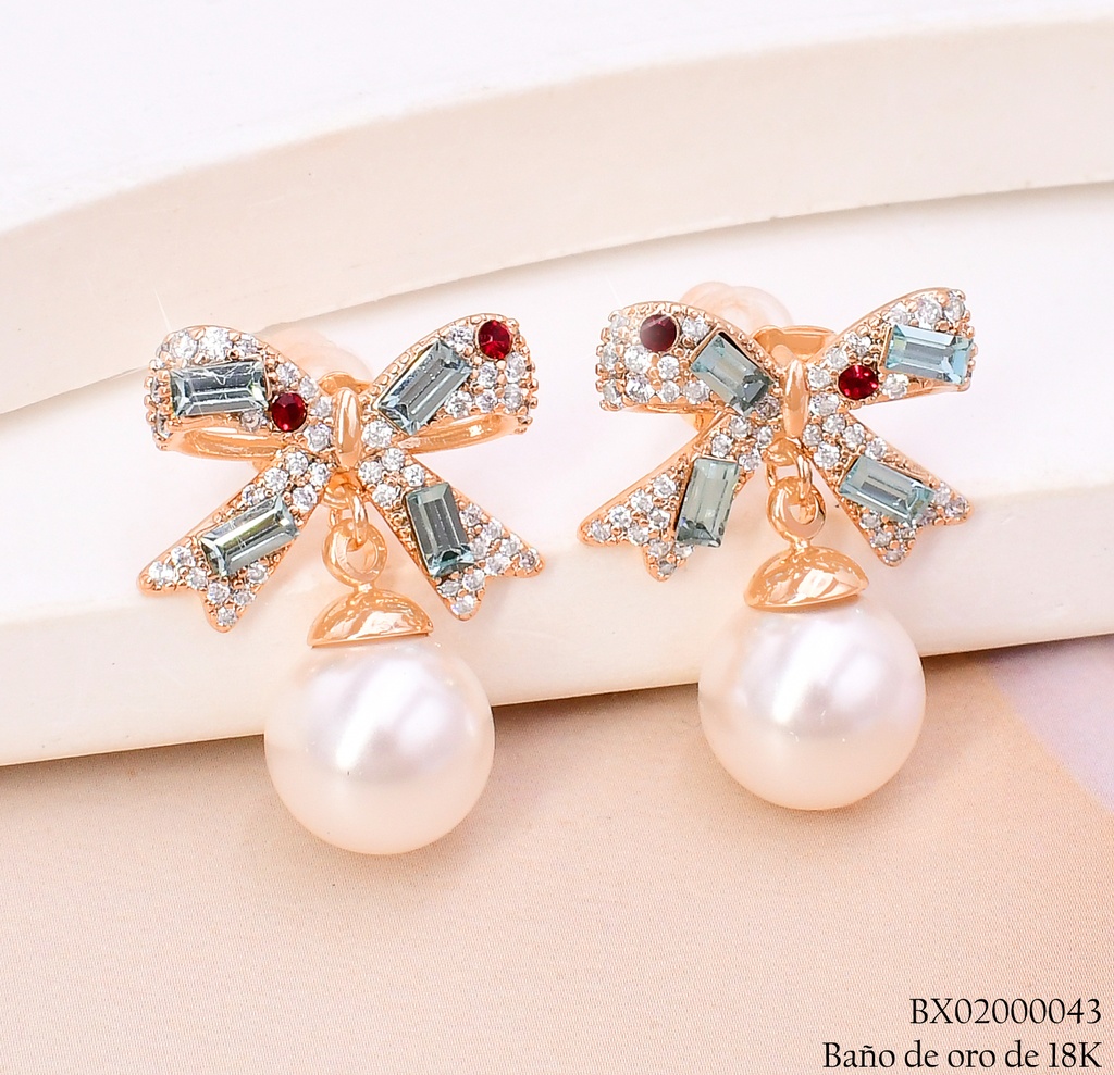 ARETES BAÑO DE ORO 18K. XUPING LAZOS ZIRC.CELESTES C/PERLA (X)