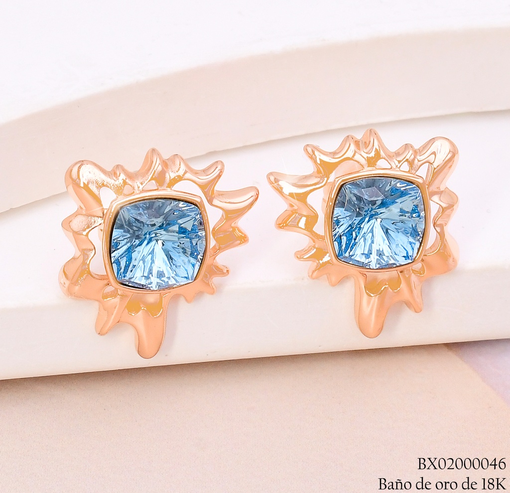 ARETES BAÑO DE ORO 18K. XUPING SOL IRREG.ZIRC.CELESTES CENTRO JESM-3772(X)