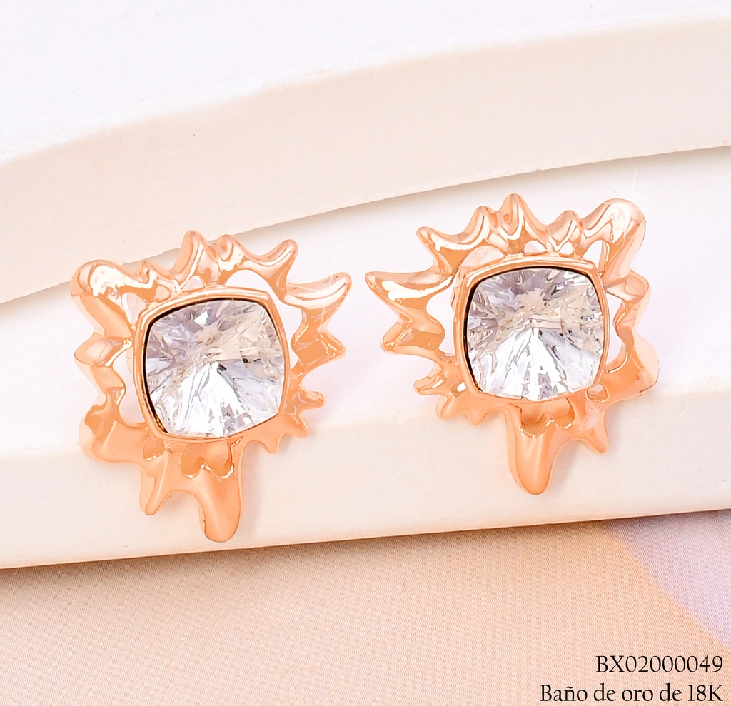ARETES BAÑO DE ORO 18K. XUPING SOL IRREG.ZIRC.RD. CENTRO JESM-3772(X)