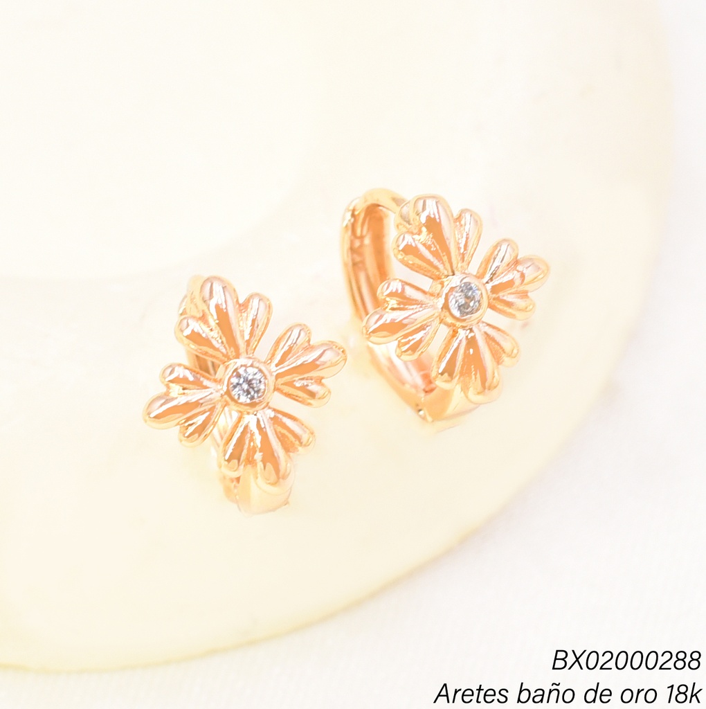 ARETES HUGGIES BAÑO DE ORO 18K. XUPING  FLOR  ZIRC.  EE5474-428 012026