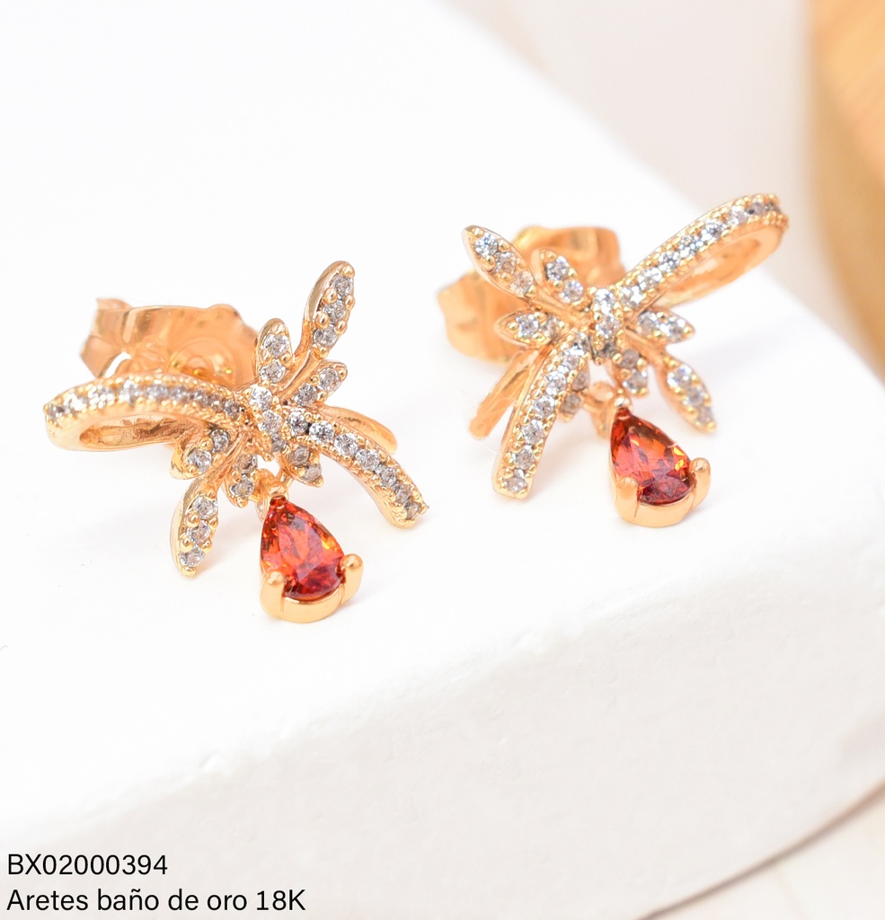 ARETES BAÑO DE ORO 18K. XUPING LAZO C/HOJITAS GOTA ZIRC.ROJA JELX-12337