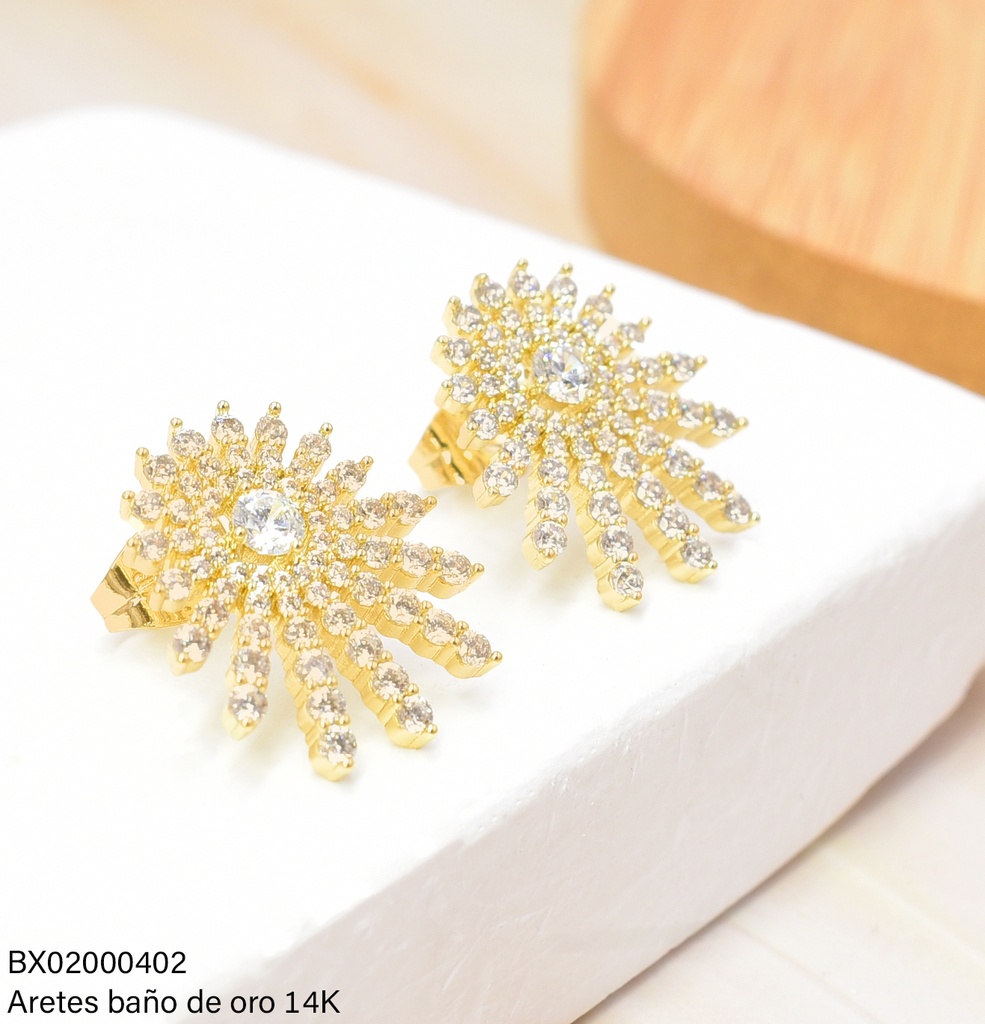 ARETES BAÑO DE ORO 14K. XUPING SOL ZIRC.RAYOS ASIMETRICOS JEYX-3119