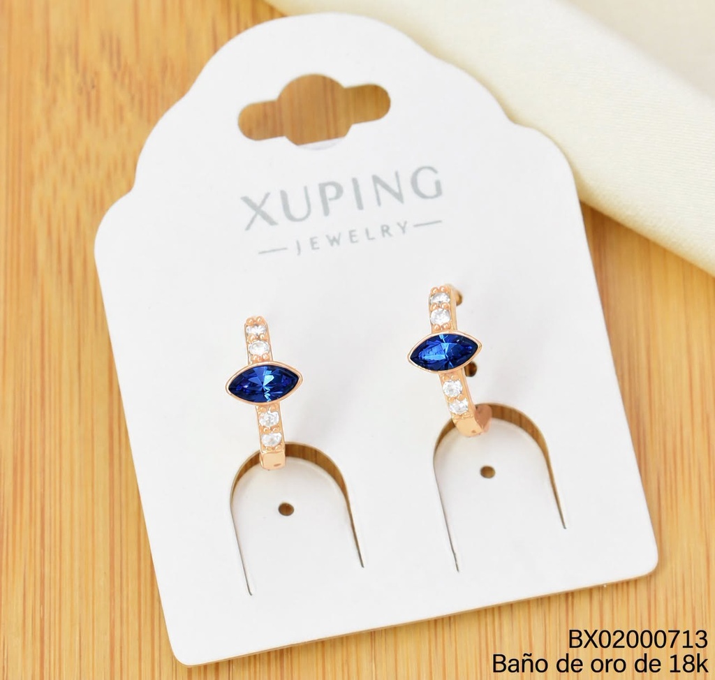 ARETES HUGGIES BAÑO DE ORO 18K XUPING OV. HORIZONTAL ZIRC.  CELESTE (X.JL)