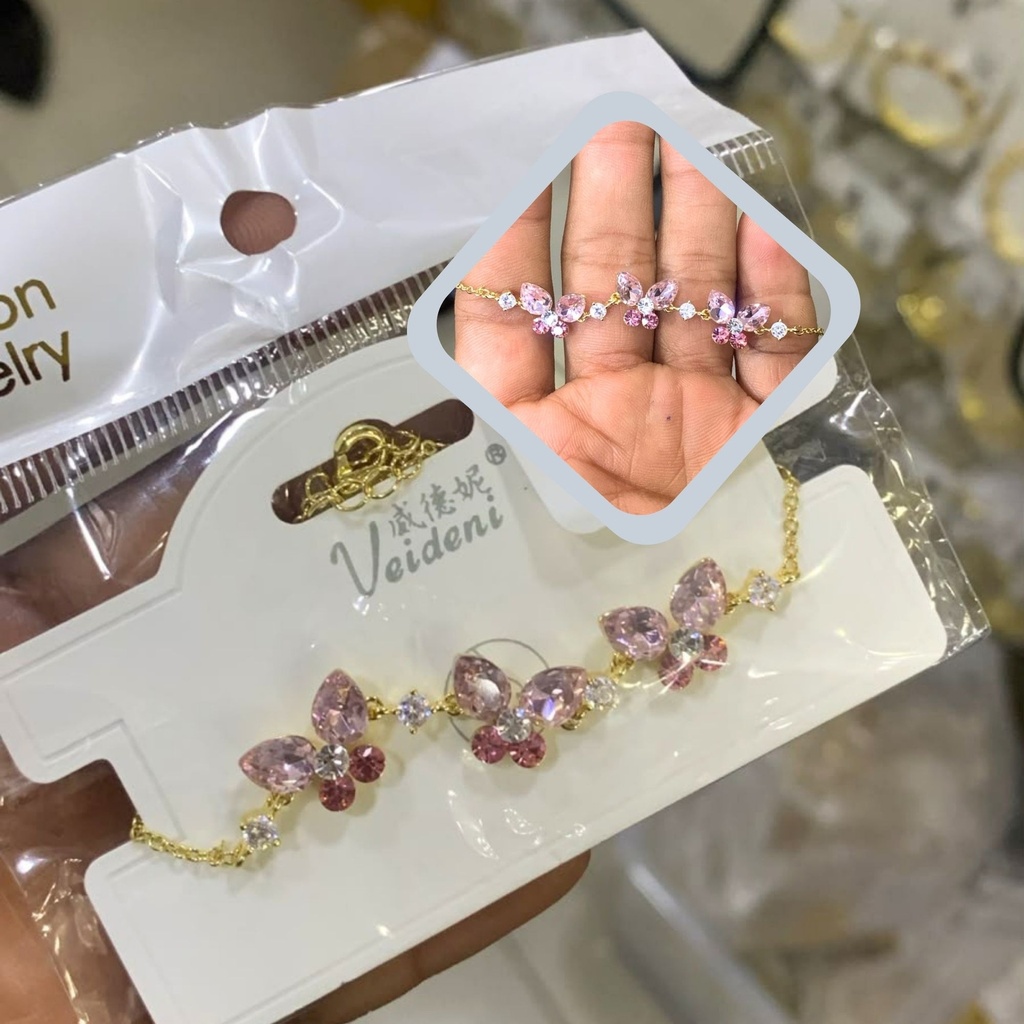 PULSERA BAÑO DE ORO 14K.3 MARIPOSAS ZIRC.ROSADAS (VEI080926)