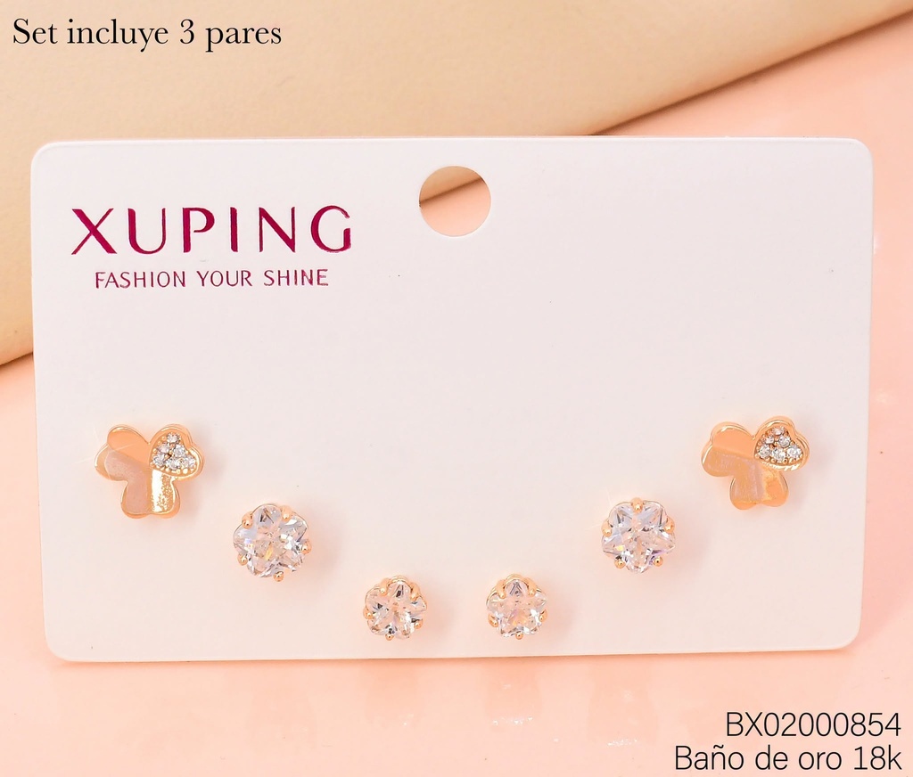 PAQ. 3 PARES ARETES BAÑO DE ORO 18K. XUPING 3 CORAZOPNES/ZIRCONIA EN ESTRELLA CRISTAL