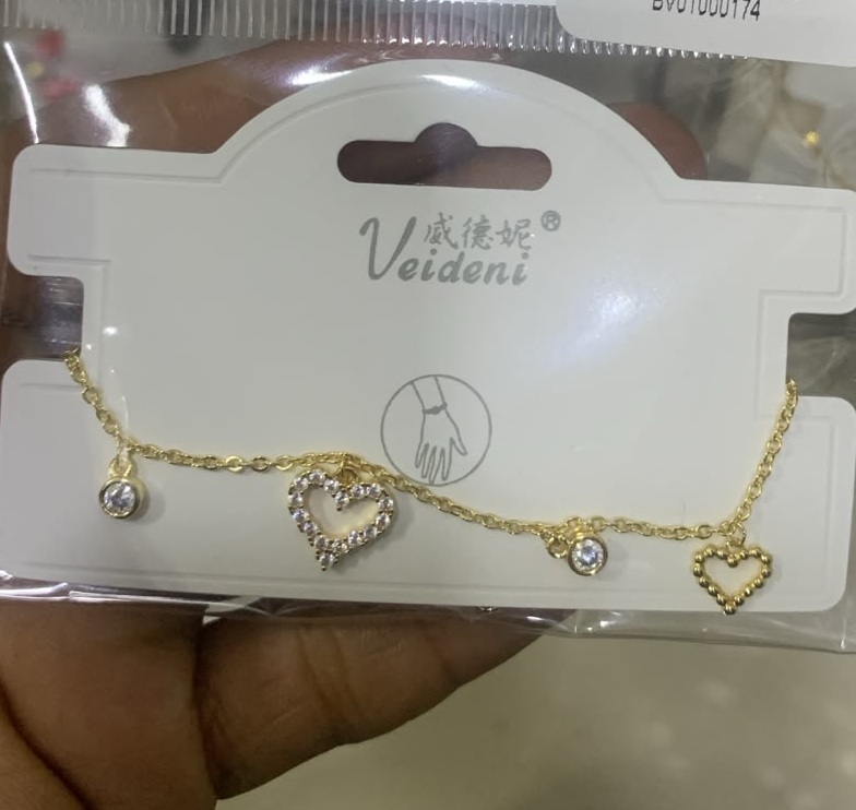 PULSERA BAÑO DE ORO 14K. CON COLGANTES CROQUI CORAZO ZIRC. SL-0173 (VEI080926)