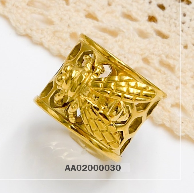 ANILLO ACERO DORADO DE PANAL CON ABEJA ENCIMA