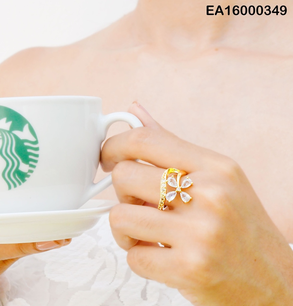 ANILLO FLOR 4 PETÁLOS ZIRC SOBRE LÍNEA ZIRC.