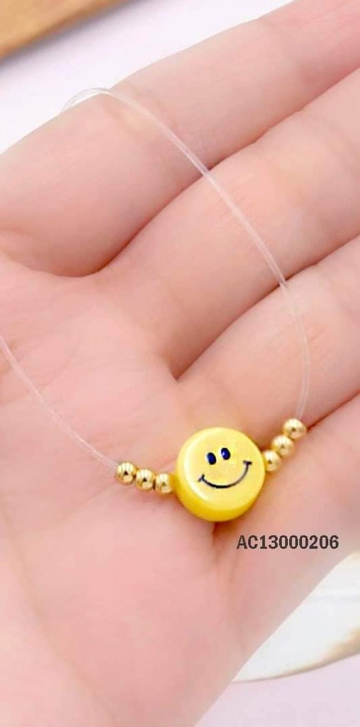 CADENA NYLON DIJE CARITA FELIZ Y PELOTITAS DORADAS