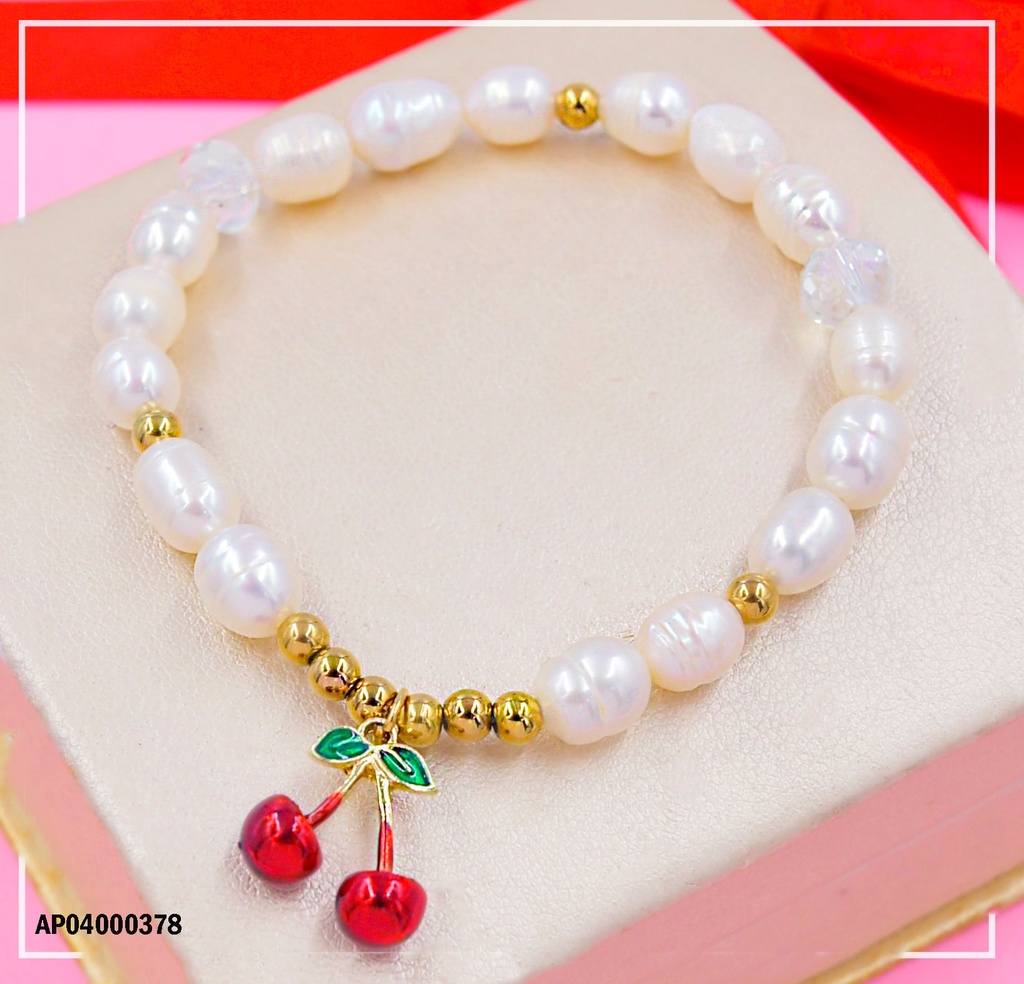 PULSERA BLANCA DIJE PELOTITAS DORADAS Y CEREZAS