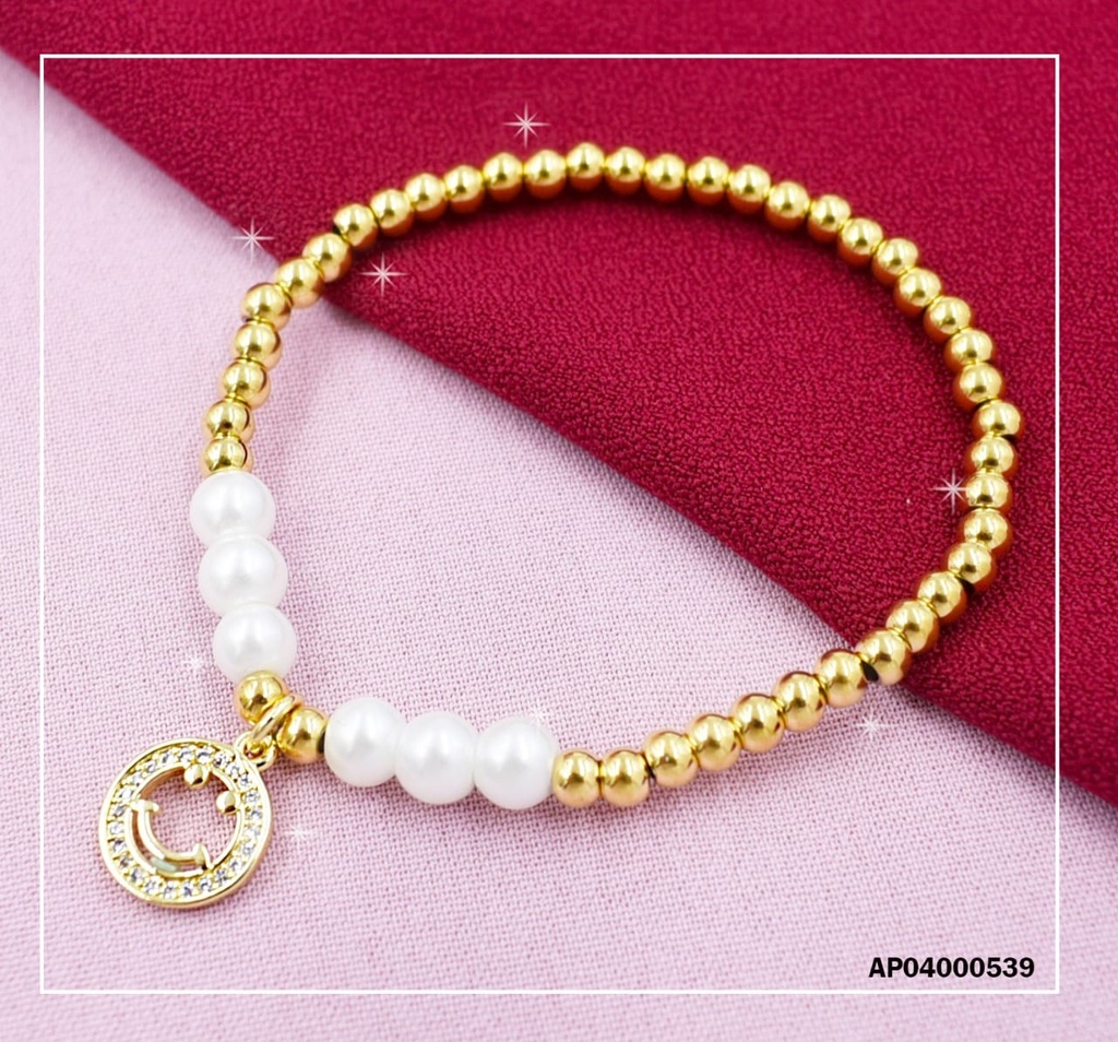 PULSERA PELOTITAS DORADAS, BLANCAS AL CENTRO, DIJE CROQUI CARITA FELIZ