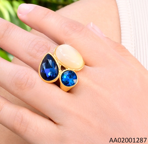 [AA02001287] ANILLO DORADO PIEDRA OV. CREMA / ZIRC AZULES RA620-305