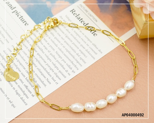 [AP04000492] PULSERA SEIS PELOTITAS BLANCAS AL CENTRO